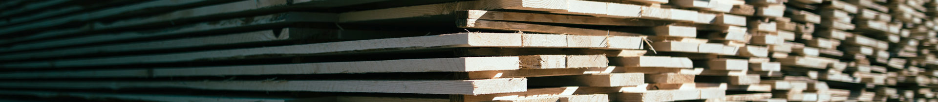 piles of wood lumber