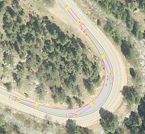 Trucks tracking across lanes in tight, narrow curves