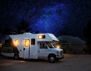 Motor home with starry night sky